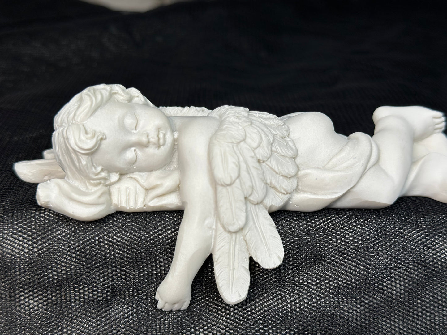 Laying Cherub Shelf Ornament (hanging arm)