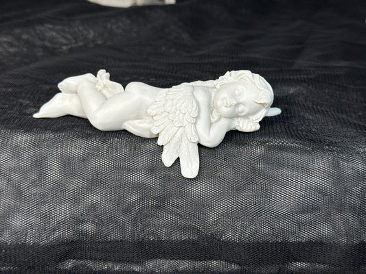 Laying Cherub Shelf Ornament (leaning arm)