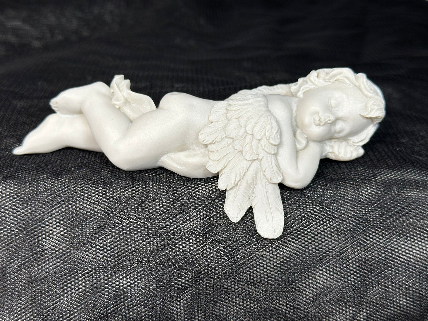 Laying Cherub Shelf Ornament (leaning arm)