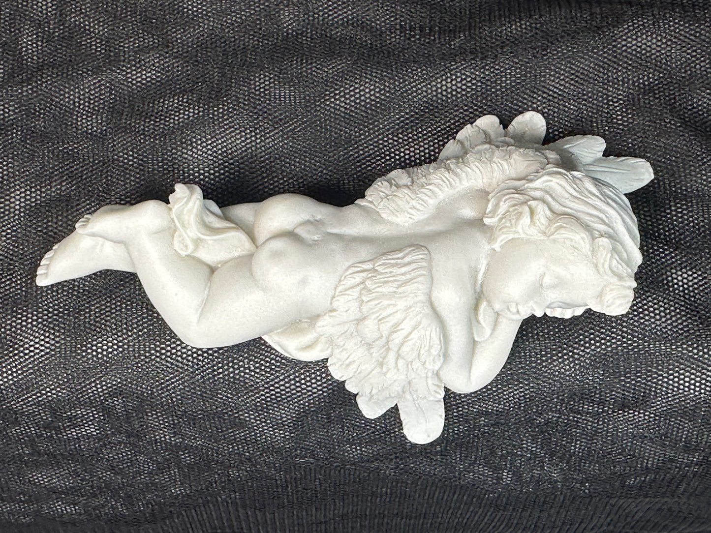 Laying Cherub Shelf Ornament (leaning arm)